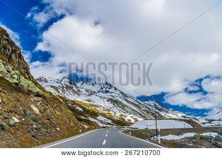Road Amoung Snowy Alps Mountains, Fluelapass, Davos,  Graubuenden Switzerland