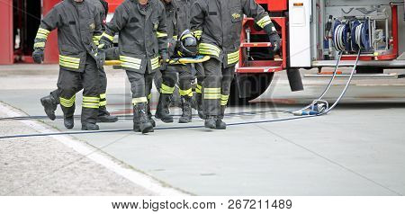Italia, Italy - May 10, 2018: Italian Firemen Transport An Injured On The Stretcher During A Practic
