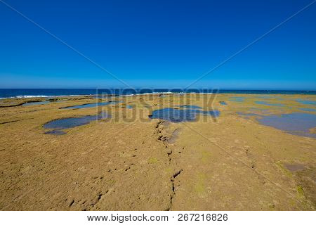 Rocky Seaside In Trafalgar Cape Coastline