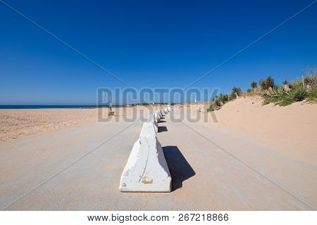 White Concrete Blocks Separators On Road