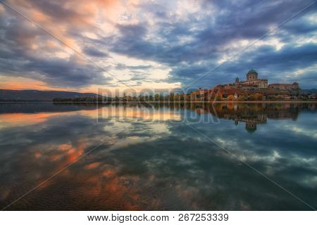 Amazing Sunrise View Over Danube River, Beautiful Reflections Of Morning Clouds Mirrored In Water, E