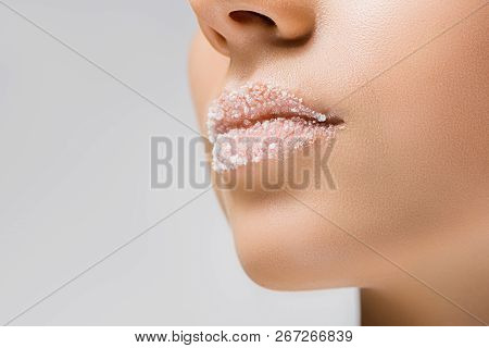 Close Up Of Young Woman With Sugar On Lips