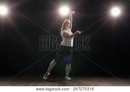 Hip-hop, Jazz-funk, Tecktonik, Waacking, Trance And Street Dances Concept - Young Woman Dancing Jazz