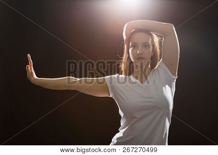 Hip-hop, Jazz-funk, Tecktonik, Waacking, Trance And Street Dances Concept - Young Woman Dancing Jazz