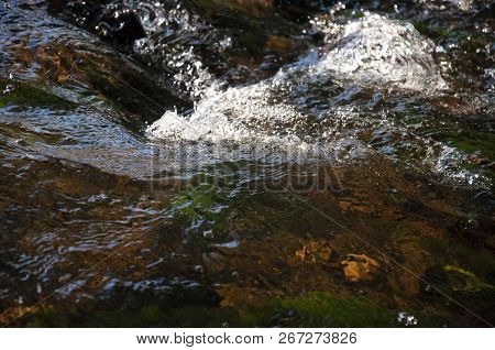 Waterfalls In Summer. Clear And Fresh Water Are Falling Down. Tints Of Green, Blue And White. There 