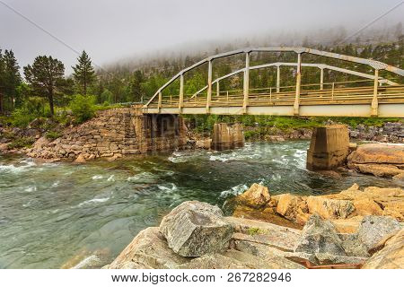 Bridge Over Mountain River, Norwegian Landscape. Cloudy Foggy Day, Rainy Weather. Saltfjellet - Svar