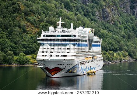 Geiranger, Norway - July 17, 2017: The Cruise Ship Aidabella Of The Shipping Company Aida Cruises Ha