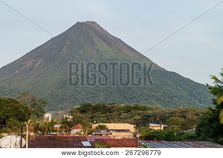 Volcano Arenal Soaring Behind La Fortuna Village, Costa Rica