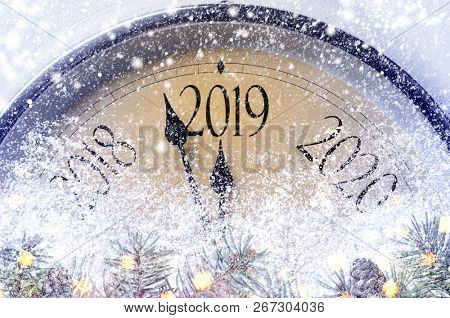 Countdown to midnight. Retro style clock counting last moments before Christmass or New Year 2019.