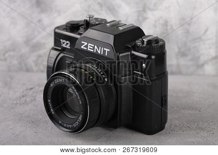 Moscow, Russia, May 14, 2017. The Old Soviet 35 Mm Slr Camera Zenit 122, Released 1997, On Cement Ba