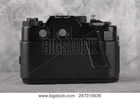 Moscow, Russia, May 14, 2017. The Old Soviet 35 Mm Slr Camera Zenit 122, Released 1997, On Cement Ba