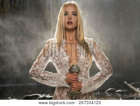 the legend of lady of the lake, beautiful woman with sword in white lace underwear, fantasy image