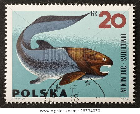 Polen - CIRCA 1966: et frimærke, trykt i Polen viser billede af Dinichthys, en forhistoriske fisk existin