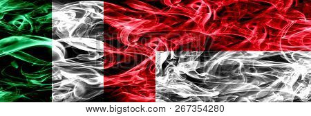 Italy Vs Monaco, Monacan Smoke Flags Placed Side By Side. Thick Abstract Colored Silky Smoke Flags