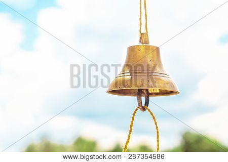 The Bell Hangs On A Rope Against The Sky