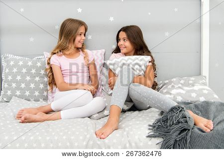 Girls Happy Best Friends Or Siblings In Cute Stylish Pajamas With Pillows Sleepover Party. Sisters H
