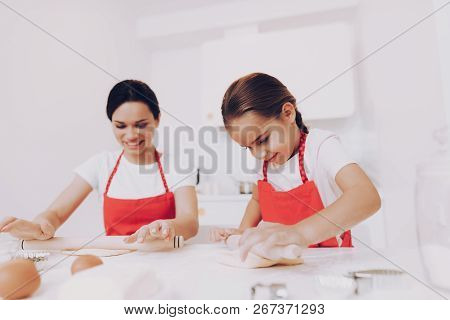 Girl And Egg And Dough With Rolling Bake A Cake. Tries Cook With Beautiful Mom. Breakfast For All Fa