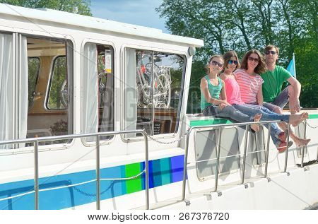 Family Vacation, Summer Holiday Travel On Barge Boat In Canal, Happy Kids And Parents Having Fun On 