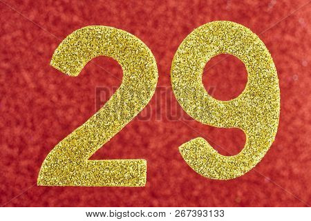 Number Twenty-nine Golden Color Over A Red Background. Anniversary. Horizontal