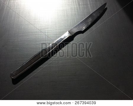 Full Metal Table Knife On A Dark Background, Table Knife, Cutlery, Dark Background, Metallic Materia