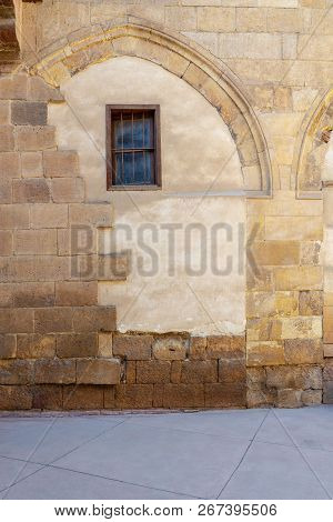 Front View Of Grunge Stone Bricks Wall And Small Window At Darb Al Ahmar District, Cairo, Egypt