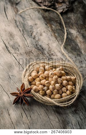 Fresh Prepared Chickpeas Over Rustic Wooden Table Close Up.