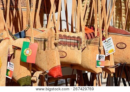 Albufeira, Portugal - June 10, 2017 - Traditional Portuguese Cork Handbags For Sale In The Old Town,