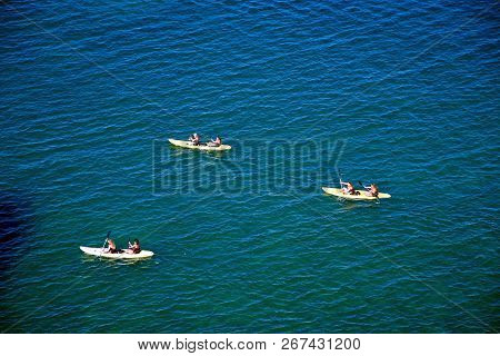 Lagos, Portugal - June 10, 2017 - Elevated View Tourists In Kayaks In The Bay, Ponta Da Piedade, Lag