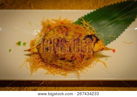 Baked Crab Shell Stuffed With Crab Meat And Black Truffle Paste