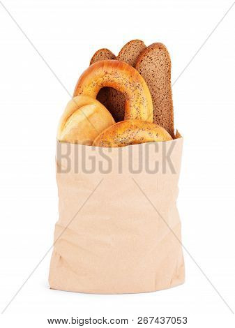 Paper Bag With Different Kind Of Bread On A White Background