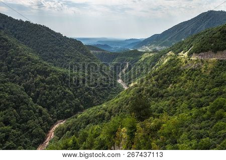 Green Enguri River Valley High In The Georgian Mountains