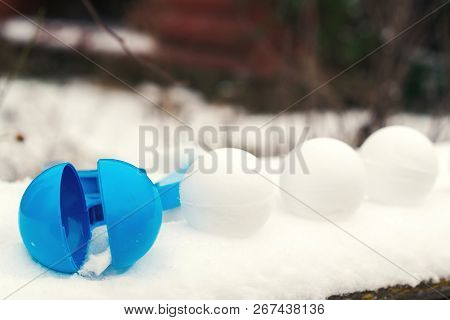 Snowballs With Snowball Maker. Kid Winter Games With Snow. Snowballs Game. Outdoors.