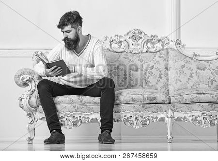 Self Improvement Concept. Macho On Concentrated Face Reading Book. Guy Reading Book With Attention. 