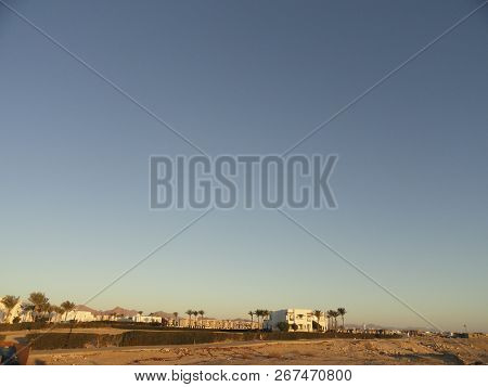 Egypt: Lonely Standing Building In The Desert Among The Sands In The Rays Of The Rising Sun In The E