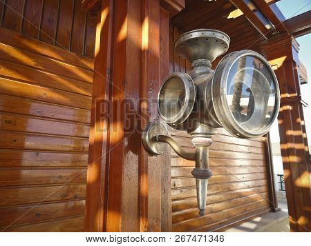 Vintage Vintage Original Lamp On A Moraine Wall. Steel Lamp Street Waterproof