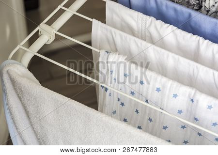 Laundry Drying On The Clotheshorse. Homekeeping Concept
