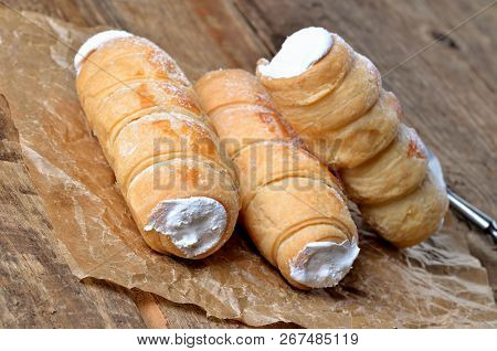 Close-up Of Custard Tube Of Pastry Filled With Cream - Dessert Cake - Traditional Czech Sweet On Bak