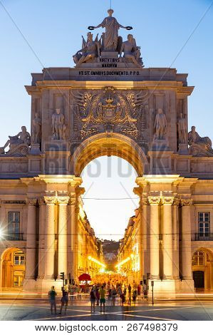 The Rua Augusta Arch (1873) In Downtown Lisbon, Portugal At Sunset