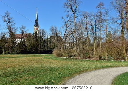Villette-park In The Town Of Cham On A Spring Sunny Day. View Of The Saint Jacob Church. Cham, Canto