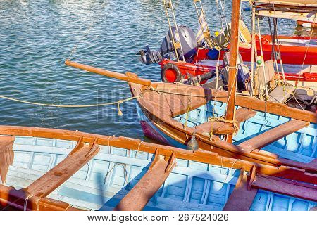 Line Of Fishing Mortorized Boats Moored At Pier At Greek Marina In Heraklion City, Crete.horizontal 