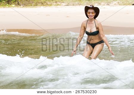 Woman Beautiful Breast Happy With Bikini Hat And Wave On Beach At Bang Beot Beach, Chumphon Province