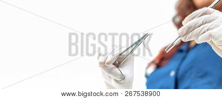 Doctor Holding Surgical Forceps Suture Needle, Suturing Material