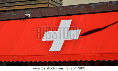 Swiss Flag For Decoration At Coffee Shop In Bern, Switzerland.