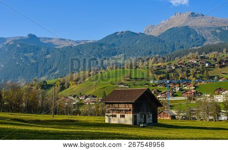Landscape With Mountain Village In Autumn