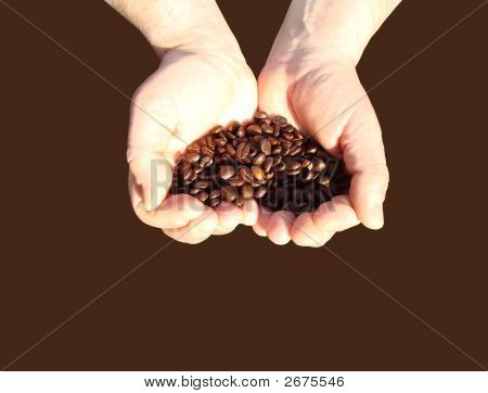 Le mani pieno di caffè