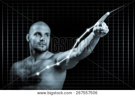 Young Man In Growth Concept With A Graph.serious Man Drawing Strategy On Virtual Screen On Dlack Iso