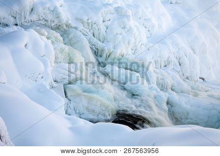 frozen waterfall Tannforsen in winter, Sweden