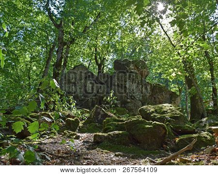 Devils Finger. The Rock Damaged By Explosion In The Woods Of Kuban.
