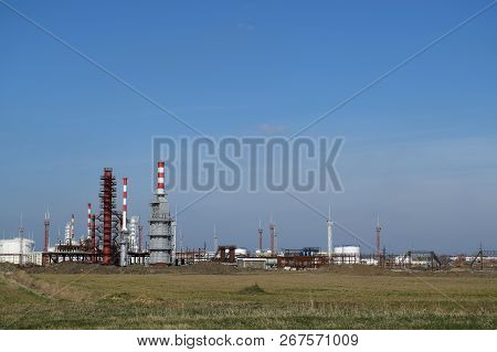 Distillation Columns, Pipes And Other Equipment Furnaces Refinery. The Oil Refinery. Equipment For P