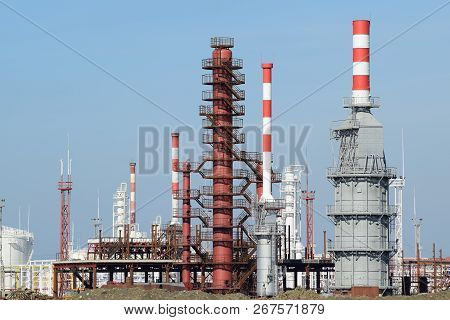 Distillation Columns, Pipes And Other Equipment Furnaces Refinery. The Oil Refinery. Equipment For P